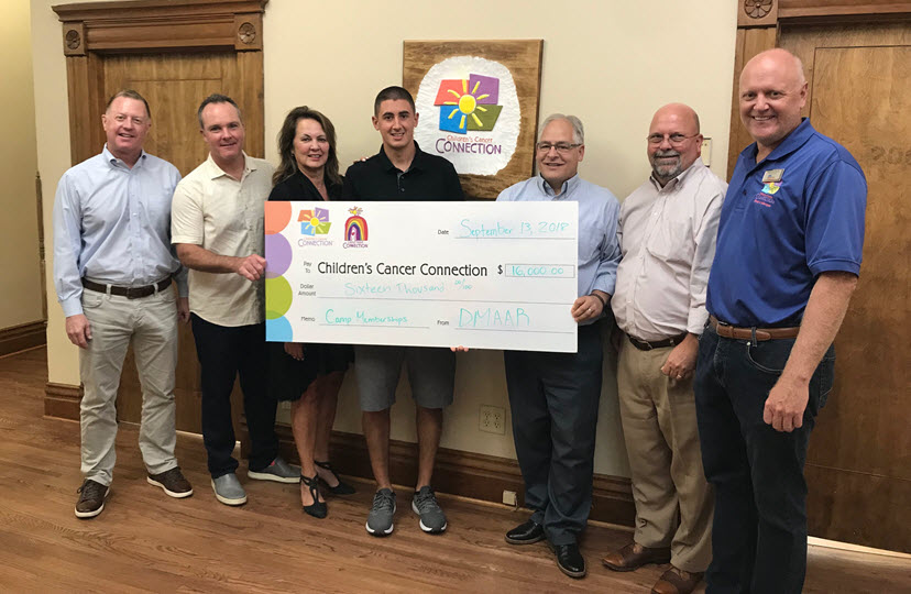 DMAAR Golf Check to Childrens Cancer Connection